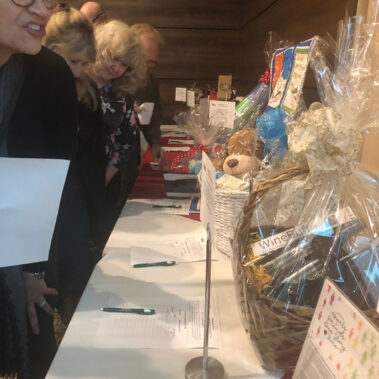 Slient-auction-people-looking-at-gifts