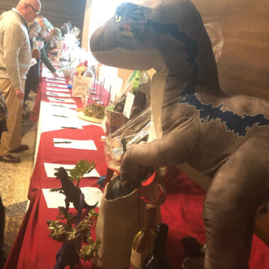Silent auction table dinosaur