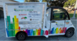 Side picture of the Monrovia Reads van with Titles and sponsors