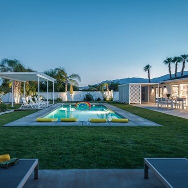 Swimming pool and grass of a hotel