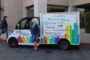Barbara Radford in front of the Monrovia Reads van.